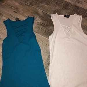 crossed tank tops